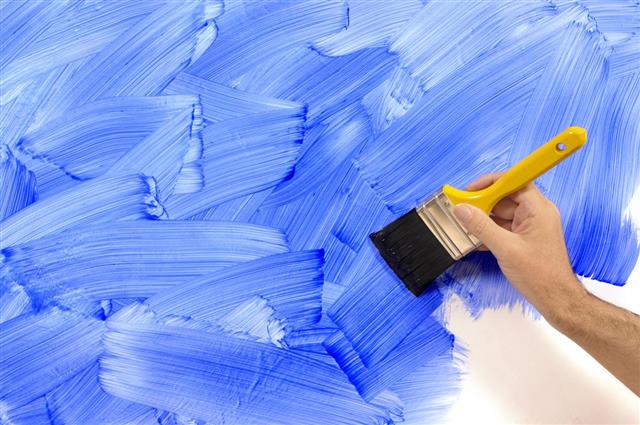 splatter paint wall with a toothbrush